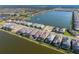 Aerial view of the community with waterfront homes, serene lakes, and meticulous landscaping at 448 Bocelli Dr, Nokomis, FL 34275