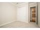 Bedroom featuring plush carpet flooring, double door closet and access to the Primary bathroom at 448 Bocelli Dr, Nokomis, FL 34275