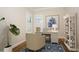 Bright home office with natural light, built in shelving and neutral decor at 448 Bocelli Dr, Nokomis, FL 34275
