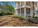 View of a well-maintained exterior with a screened patio and garden space at 4802 51St W St # 1816, Bradenton, FL 34210
