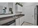 Updated kitchen area with stainless steel dishwasher, white cabinets, and spacious countertops at 4802 51St W St # 1816, Bradenton, FL 34210
