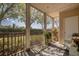 Charming screened porch providing a peaceful outdoor seating area with garden views at 4802 51St W St # 1816, Bradenton, FL 34210