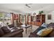 Comfortable living room with tile flooring, neutral walls, and plenty of natural light at 5458 Jessamine Ave, North Port, FL 34291