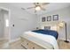 Bright bedroom with a ceiling fan and natural light at 562 Silk Oak Dr, Venice, FL 34293