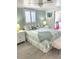 Calm and inviting bedroom with shuttered windows and coordinating decor at 599 Carmel Rd, Venice, FL 34293