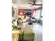 Cozy living room with colorful decor and plenty of seating, perfect for relaxing or entertaining at 599 Carmel Rd, Venice, FL 34293