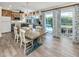 Eat-in kitchen area with modern finishes and a beautiful chandelier at 601 Apalachicola Rd, Venice, FL 34285