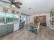 Eat-in kitchen area with modern finishes and views of the pool at 601 Apalachicola Rd, Venice, FL 34285