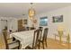 Traditional dining room featuring a chandelier and wood floors at 6146 Rockefeller Ave, Sarasota, FL 34231