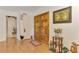 Inviting foyer featuring wood flooring and decorative accents at 6146 Rockefeller Ave, Sarasota, FL 34231