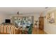 Cozy living room with hardwood floors and a view of the lanai at 6146 Rockefeller Ave, Sarasota, FL 34231