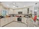 Bright kitchen with granite counters, stainless steel appliances, and an efficient layout at 6216 Pecan Rd, Venice, FL 34293