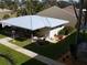 A view from above shows the backyard area with seating and well-maintained landscaping at 649 S Tamiami S Trl # 304, Venice, FL 34285