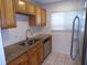 Modern kitchen with stainless steel appliances, granite countertops, and ample cabinet space at 649 S Tamiami S Trl # 304, Venice, FL 34285