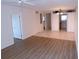 Living room with tiled dining area and views into the kitchen and other rooms at 649 S Tamiami S Trl # 304, Venice, FL 34285
