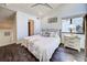 Charming bedroom with vaulted ceiling, dark wood floors, and cozy decor at 700 Golden Beach Blvd # 224, Venice, FL 34285