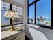 Bedroom view showcasing ocean views, palm trees, and a bright sunny day at 700 Golden Beach Blvd # 224, Venice, FL 34285