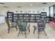 The library features multiple bookshelves stocked with books, comfy chairs and good lighting at 700 Golden Beach Blvd # 224, Venice, FL 34285