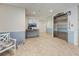 Well-maintained lobby area featuring neutral decor, tile floors, and convenient elevator access at 700 Golden Beach Blvd # 224, Venice, FL 34285