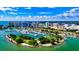 Stunning aerial view of marina and cityscape showcasing the waterfront location at 770 S Palm Ave # 404, Sarasota, FL 34236