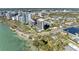 Aerial view of a waterfront condo with stunning city skyline and bay views at 770 S Palm Ave # 404, Sarasota, FL 34236