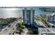 Aerial shot highlighting the building's location near the bay and roadway at 770 S Palm Ave # 404, Sarasota, FL 34236