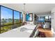 Bright dining area with waterfront views, enhancing meal times with stunning views of the surrounding landscape at 770 S Palm Ave # 404, Sarasota, FL 34236