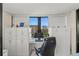 Bright office space with large windows, a sleek desk, and comfortable executive chair at 770 S Palm Ave # 404, Sarasota, FL 34236