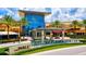 The Mall at University Town Center featuring a modern exterior and lush landscaping at 770 S Palm Ave # 404, Sarasota, FL 34236