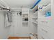 Organized walk-in closet with custom shelving, drawers, and ample storage space for clothes and accessories at 770 S Palm Ave # 404, Sarasota, FL 34236