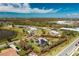 Spacious property featuring a pool home with mature landscaping, outlined in red at 8170 Casa De Meadows Dr, Englewood, FL 34224