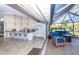 Updated kitchen that opens up to the screened in lanai, creating a perfect indoor/outdoor space at 8170 Casa De Meadows Dr, Englewood, FL 34224