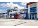 Baseball stadium entrance featuring ticket booths, gates, and modern architecture with clear signage at 8170 Casa De Meadows Dr, Englewood, FL 34224