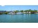 Waterfront with docked boats and yachts, offering easy access to boating and water activities at 8170 Casa De Meadows Dr, Englewood, FL 34224