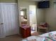 View of bedroom with bathroom and closet, showing the layout and design at 822 Bogie St, Venice, FL 34285