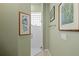 Modern walk-in shower with glass door and tiled walls in a well-lit bathroom at 902 Tartan Dr # 29, Venice, FL 34293
