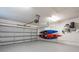 Spacious garage with epoxy floor and kayak storage at 902 Tartan Dr # 29, Venice, FL 34293