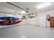 Spacious two car garage, with epoxy floor and built-in kayak storage at 902 Tartan Dr # 29, Venice, FL 34293