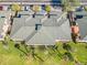 High-angle showcases the well-maintained roofs and landscaping of this neighborhood at 903 Gondola Park Dr # 903, Venice, FL 34292