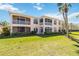 Charming multi-story home with multiple screened lanais overlooking the lush, green backyard at 903 Gondola Park Dr # 903, Venice, FL 34292
