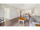 Open floorplan living room with wood look flooring and lots of natural light at 903 Gondola Park Dr # 903, Venice, FL 34292