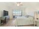 Inviting bedroom with large windows offering natural light and scenic views at 9900 Haze Dr, Venice, FL 34292