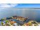Stunning aerial view of waterfront condos, private docks, and boat slips at 1 Colony Point Dr # 11A, Punta Gorda, FL 33950