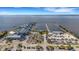Expansive aerial view showcases waterfront condos with a marina and extensive parking at 1 Colony Point Dr # 11A, Punta Gorda, FL 33950