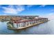 Beautiful aerial view showcases waterfront condos with red tile roofs and picturesque surroundings at 1 Colony Point Dr # 11A, Punta Gorda, FL 33950