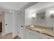 Bright bathroom featuring a vanity with granite countertop and neutral colors at 1 Colony Point Dr # 11A, Punta Gorda, FL 33950