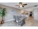Dining room featuring a view to the modern kitchen, ideal for entertaining at 1 Colony Point Dr # 11A, Punta Gorda, FL 33950
