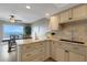 Well-lit kitchen offering plenty of storage and counter space with ocean views at 1 Colony Point Dr # 11A, Punta Gorda, FL 33950