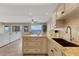 Bright kitchen with granite countertops, stainless steel faucet, and ocean views at 1 Colony Point Dr # 11A, Punta Gorda, FL 33950
