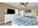 Relaxing main bedroom with a queen-sized bed, decorative pillows, and ample storage at 1 Colony Point Dr # 11A, Punta Gorda, FL 33950
